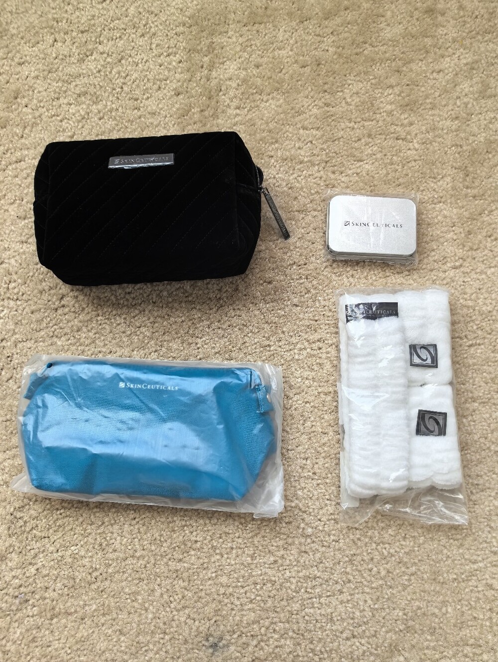 SkinCeuticals Wristlets + Headband Set​ and gift bag bundle